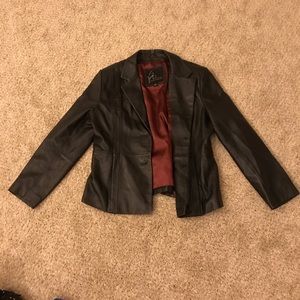 Venus Williams black leather jacket